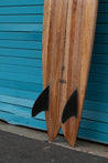 A side-view closeup of the glass-on fins shows the black option.