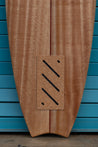 A front facing close-up of the bottom of the tow board highlights the Nomads Surfing cork traction pads at the tail of the board.