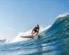 Bizia owner Joey Valenti makes a smooth bottom turn on the Bizia wooden longboard.
